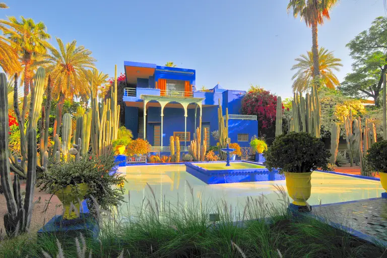 The cobalt-blue villa, cacti and yellow pots of the Majorelle Garden in Marrakech